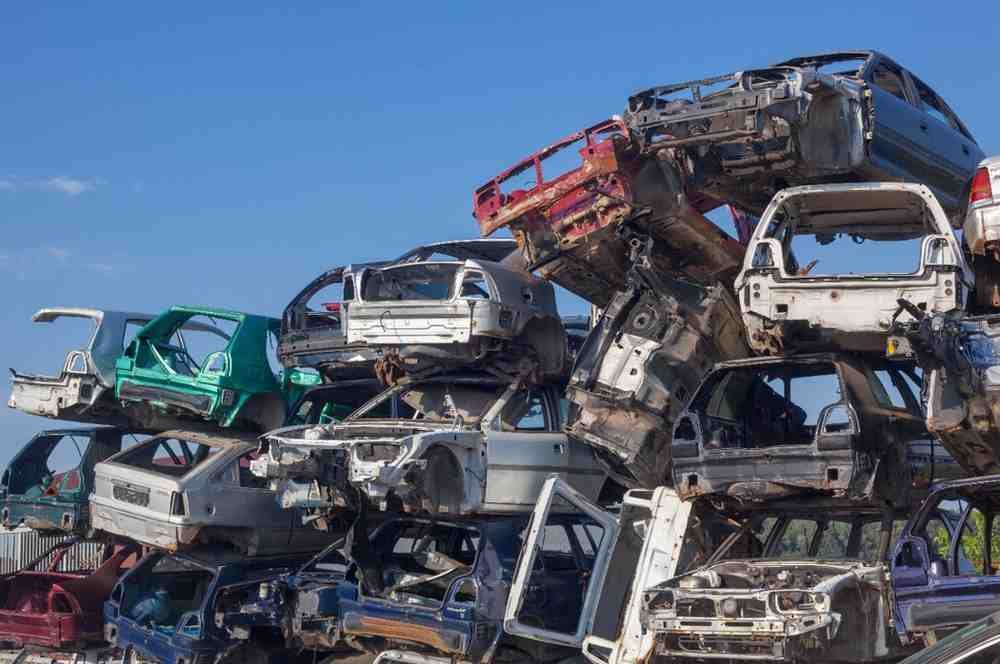 Compressed scrap automotive parts